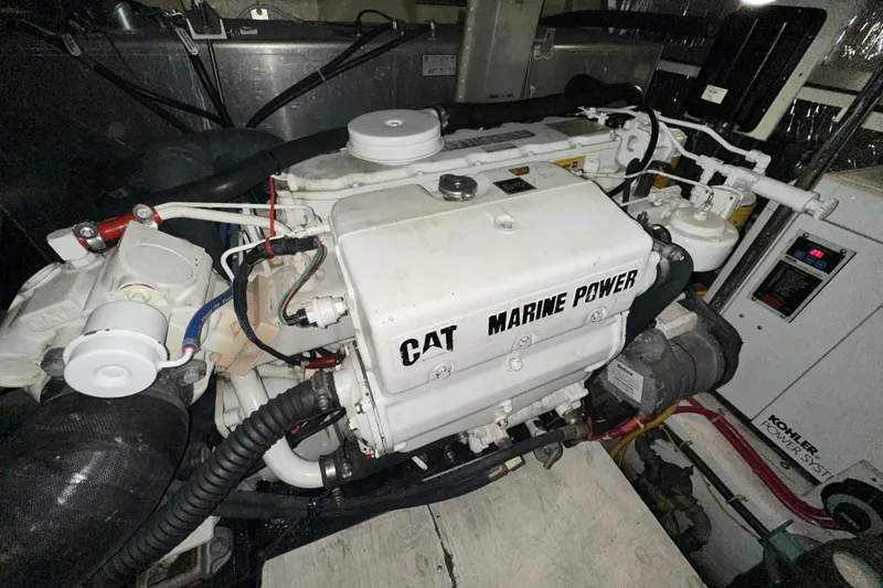 Stay The Course Yacht Photos Pics Engine room of 2006 Carver 43 Motor Yacht with CAT Marine Power engine.