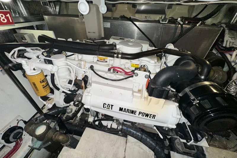 Stay The Course Yacht Photos Pics Engine room of 2006 Carver 43 Motor Yacht with CAT Marine Power engine.