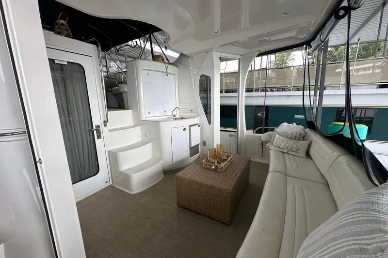 Stay The Course Yacht Photos Pics Luxurious interior of 2006 Carver 43 Motor Yacht with elegant seating and modern amenities.