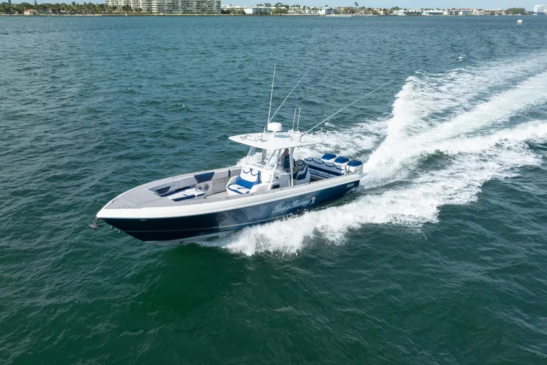 Boss's Therapy Yacht Photos Pics 2007 Intrepid 375 Center Console cruising on open water.