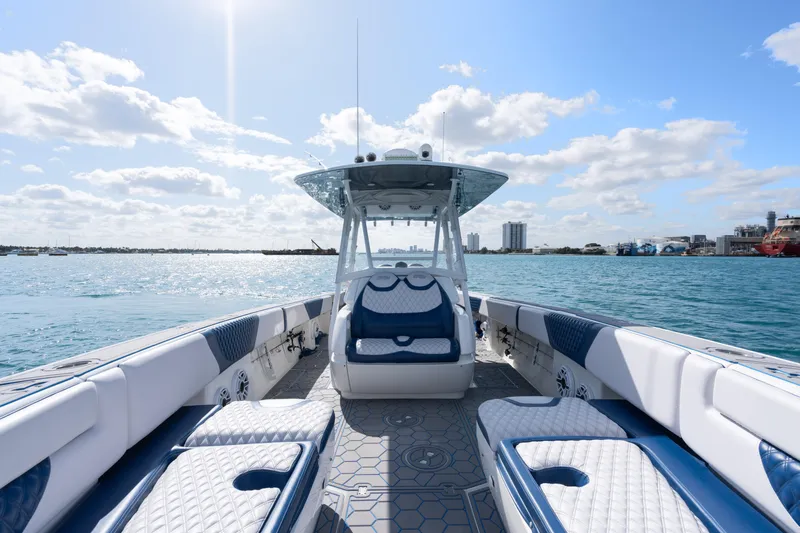 Boss's Therapy Yacht Photos Pics 2007 Intrepid 375 Center Console boat on open water under a sunny sky.