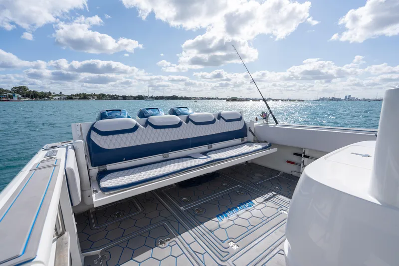 Boss's Therapy Yacht Photos Pics 2007 Intrepid 375 Center Console boat with seating, ocean view, and fishing rod.