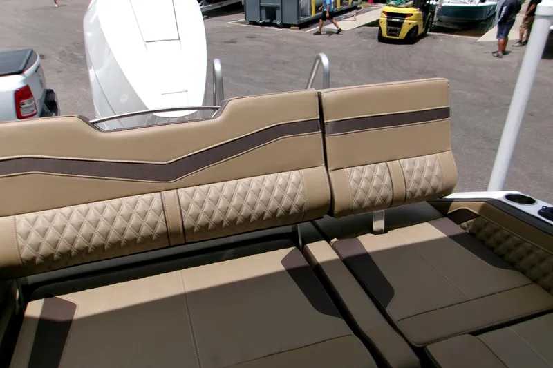  Yacht Photos Pics Luxurious seating on 2026 Monterey Elite 27 OB boat, featuring diamond-stitched upholstery.
