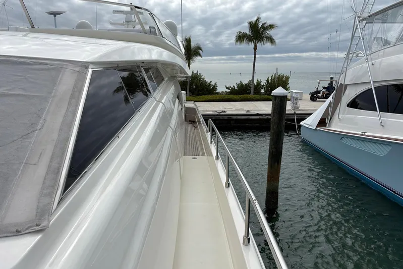 Rabbit Yacht Photos Pics 1999 Ferretti Yachts 80 RPH docked, showcasing sleek design and ocean view.