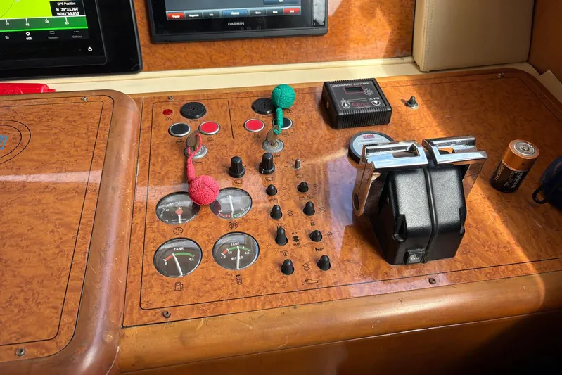 Rabbit Yacht Photos Pics Control panel of a 1999 Ferretti Yachts 80 RPH with gauges and switches.