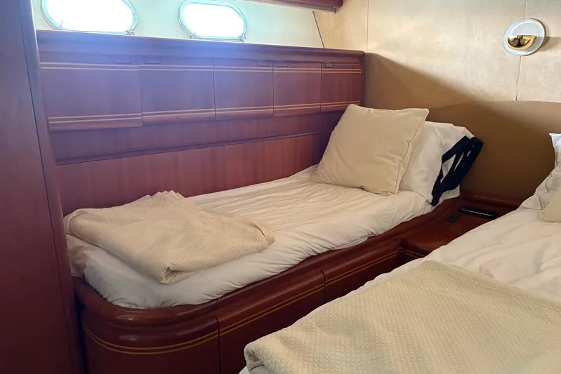 Rabbit Yacht Photos Pics Luxurious cabin interior of 1999 Ferretti Yachts 80 RPH with cozy twin beds.