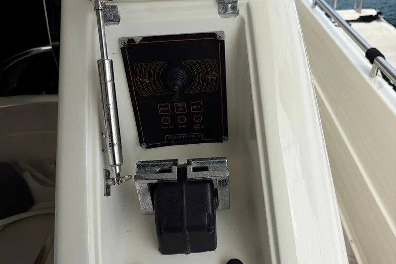 Rabbit Yacht Photos Pics Control panel on a 1999 Ferretti Yachts 80 RPH, featuring switches and hydraulic components.