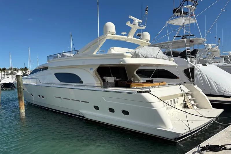Rabbit Yacht Photos Pics Luxury 1999 Ferretti Yachts 80 RPH docked at marina under clear blue sky.