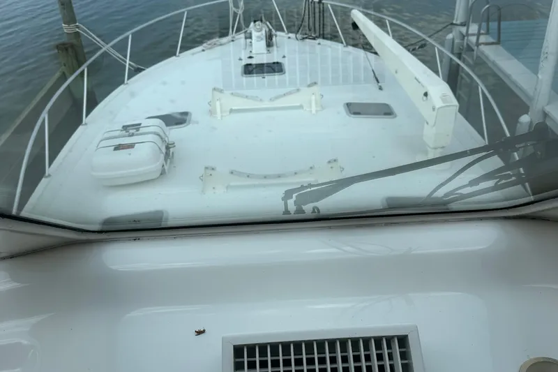  Yacht Photos Pics 1999 Riviera Convertible SF boat deck view with railing and equipment.