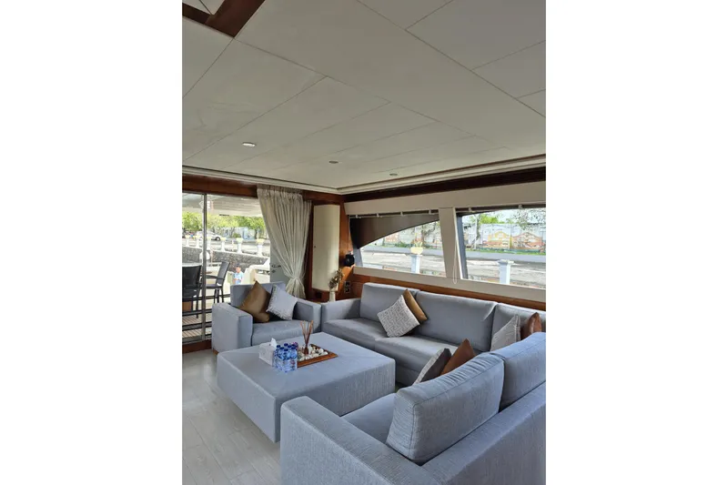  Yacht Photos Pics Luxurious interior of 2006 Ferretti Yachts 830 with elegant seating and large windows.