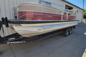 2019 Sun Tracker Party Barge 24 DLX pontoon boat on trailer.