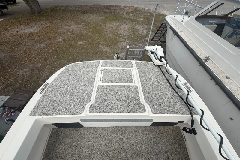  Yacht Photos Pics 2022 Eastward 30 boat deck with textured surface and mounted equipment.