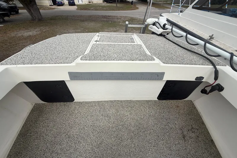  Yacht Photos Pics 2022 Eastward 30 boat deck with textured surface and measuring ruler.