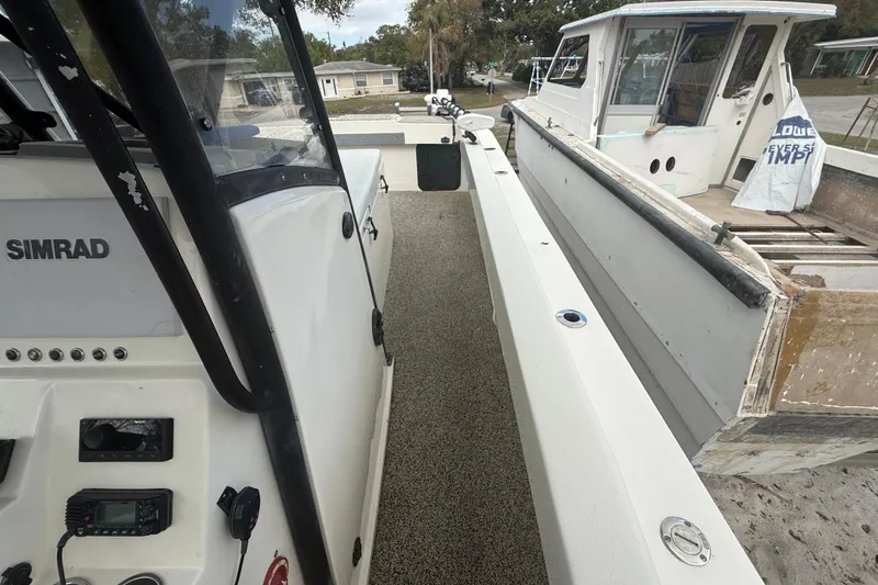  Yacht Photos Pics 2022 Eastward 30 boat interior with Simrad electronics and spacious deck.