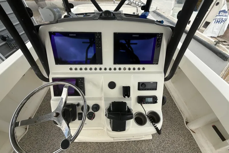 Yacht Photos Pics Control panel of a 2022 Eastward 30 boat with dual Simrad displays.