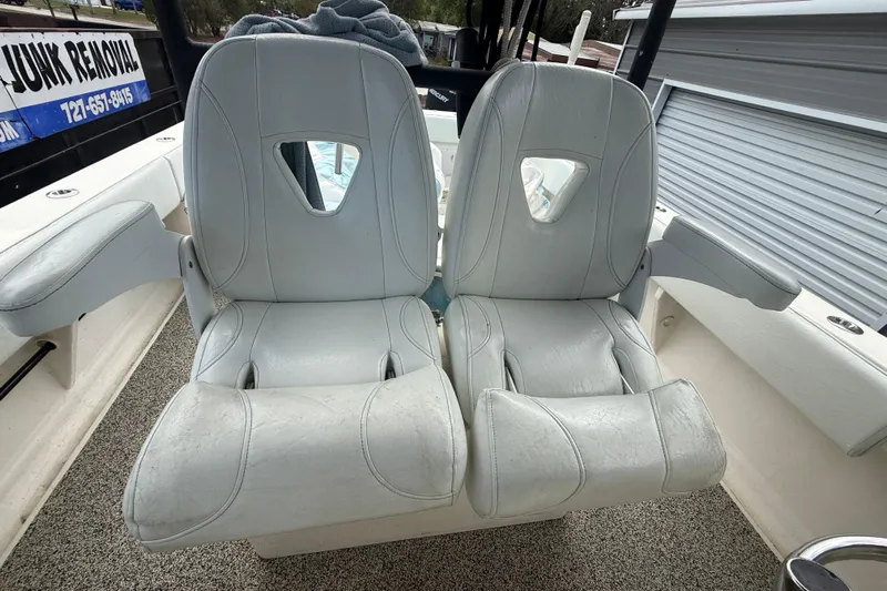  Yacht Photos Pics Two white cushioned boat seats on a 2022 Eastward 30 model.