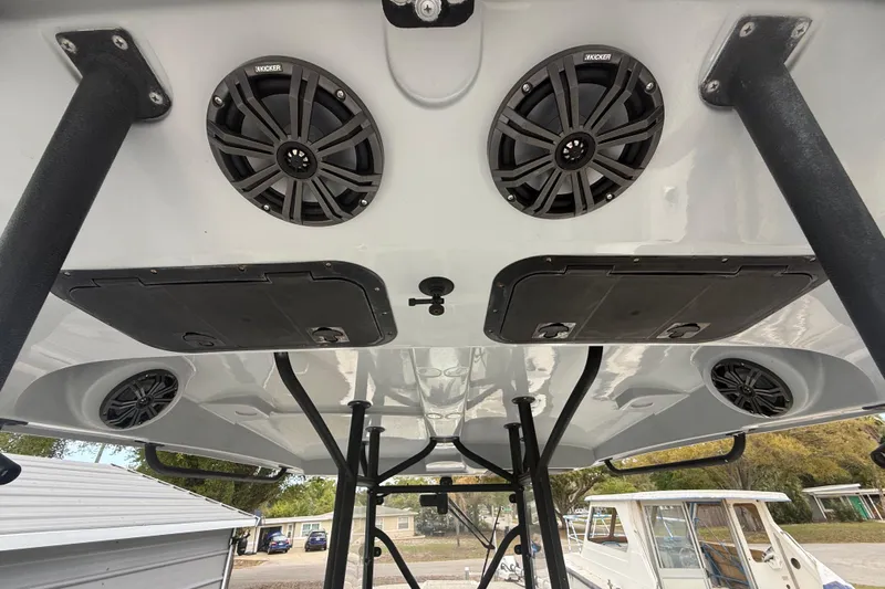  Yacht Photos Pics 2022 Eastward 30 boat roof with speakers and storage compartments.