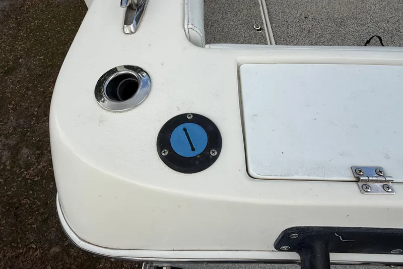  Yacht Photos Pics Close-up of a 2022 Eastward 30 boat deck with fuel cap and storage hatch.