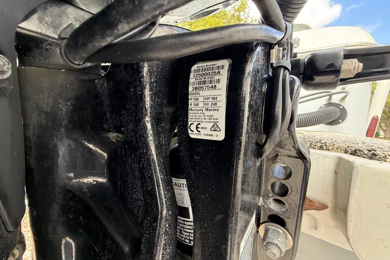  Yacht Photos Pics Close-up of a 2022 Eastward 30 boat engine with visible serial number label.