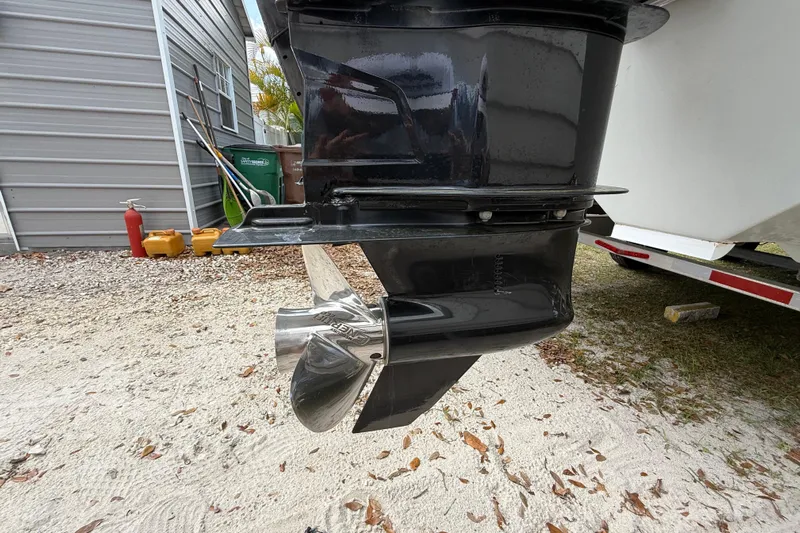  Yacht Photos Pics Outboard motor of 2022 Eastward 30 boat with stainless steel propeller.