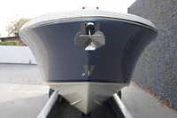 2024 Chris-Craft Launch 28 GT boat on trailer, front view, sleek design.