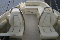 2024 Chris-Craft Launch 28 GT interior with luxurious beige seating and elegant design.