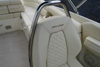 2024 Chris-Craft Launch 28 GT boat seat with elegant stitching and logo detail.