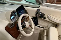 2024 Chris-Craft Launch 28 GT interior with luxurious steering and dashboard design.