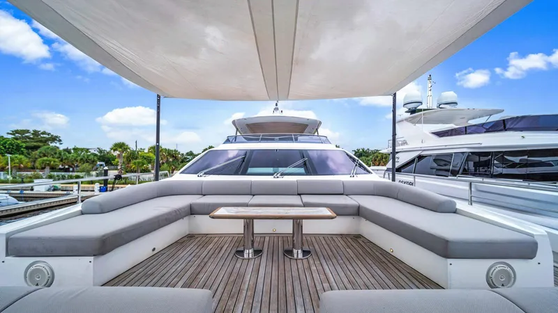 One & Only Yacht Photos Pics Luxurious 2020 Azimut Grande 32 Metri yacht with spacious deck seating and canopy.