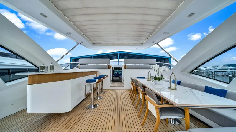 One & Only Yacht Photos Pics Luxurious Azimut Grande 32 Metri yacht deck with bar and dining area, 2020 model.