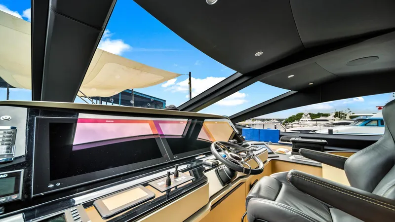 One & Only Yacht Photos Pics Luxurious interior of 2020 Azimut Grande 32 Metri yacht with modern helm and panoramic views.