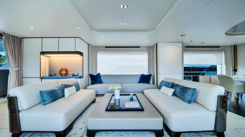 One & Only Yacht Photos Pics Luxurious interior of 2020 Azimut Grande 32 Metri yacht with modern white sofas and decor.