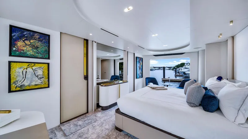 One & Only Yacht Photos Pics Luxurious bedroom interior of 2020 Azimut Grande 32 Metri yacht with modern decor.