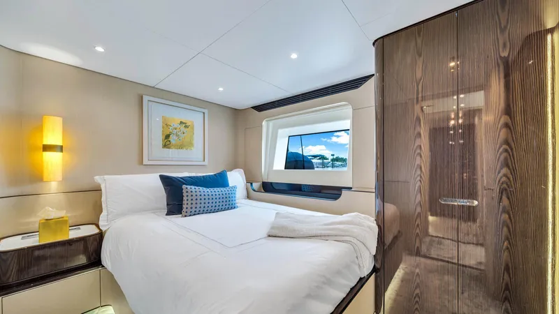 One & Only Yacht Photos Pics Luxurious bedroom interior on 2020 Azimut Grande 32 Metri yacht with modern decor.