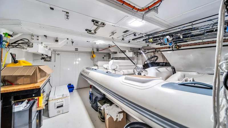 One & Only Yacht Photos Pics Interior of 2020 Azimut Grande 32 Metri yacht with stored inflatable boat.