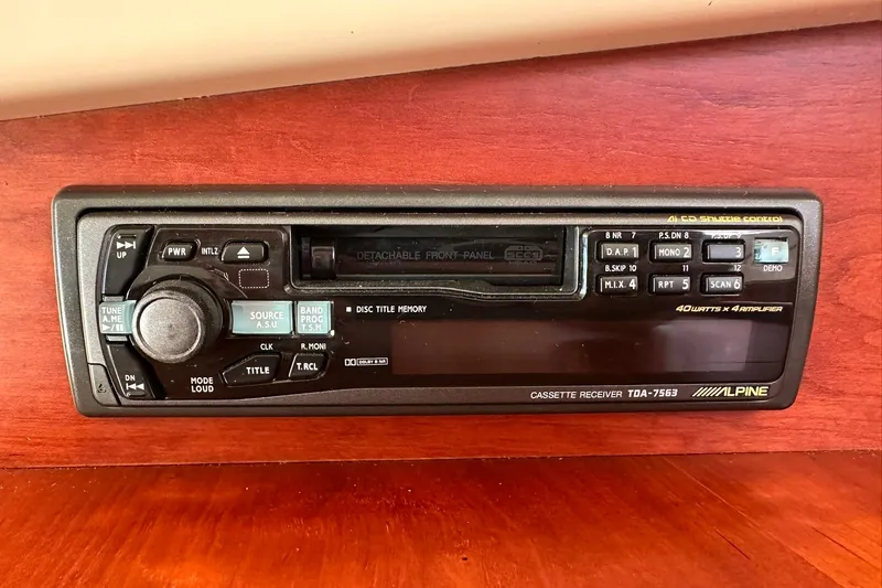 Lida Yacht Photos Pics Alpine cassette receiver in a 2000 Hinckley Picnic Boat 36, mounted on wooden panel.