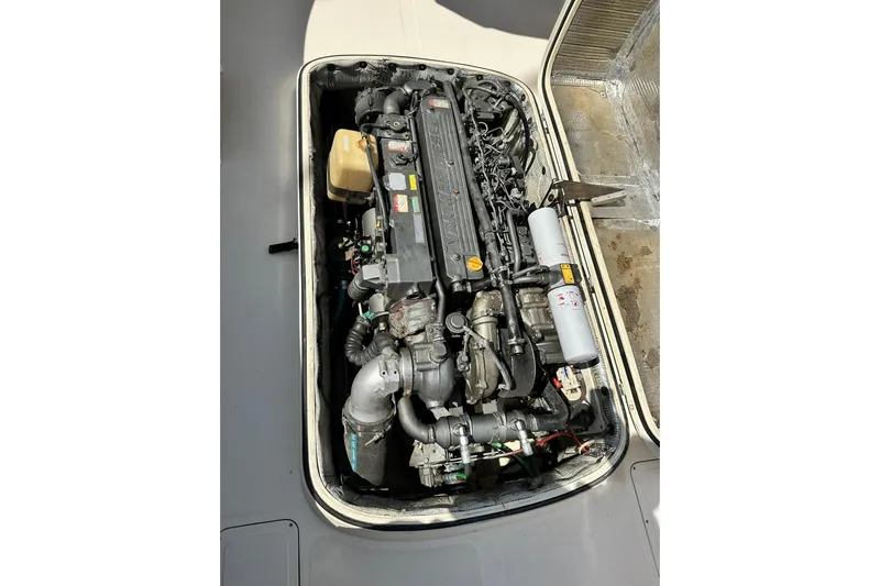 Lida Yacht Photos Pics Engine compartment of a 2000 Hinckley Picnic Boat 36, showcasing detailed mechanical components.