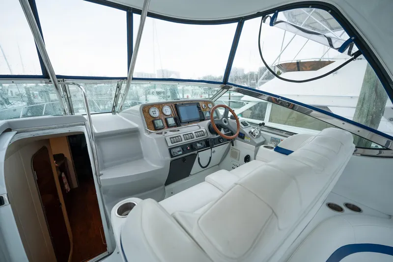  Yacht Photos Pics 2008 Formula 40 Performance Cruiser cockpit with modern controls and plush seating.