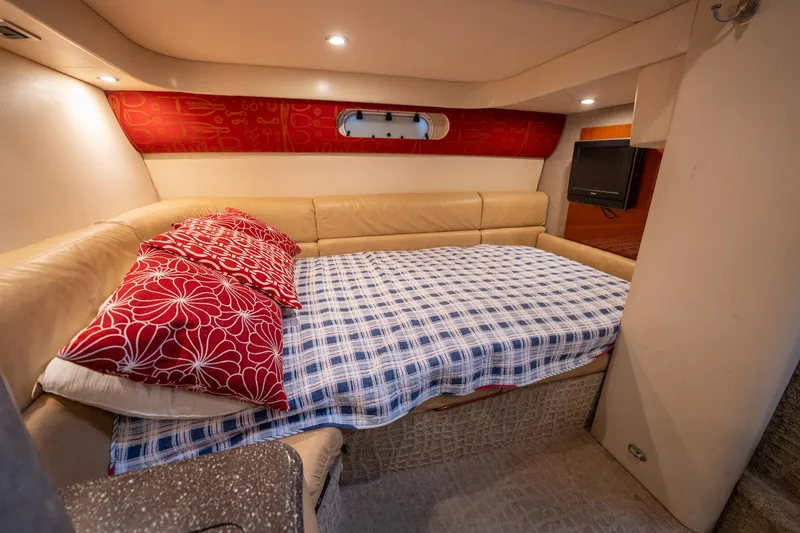  Yacht Photos Pics Interior of 2008 Formula 40 Performance Cruiser with cozy bed and stylish decor.