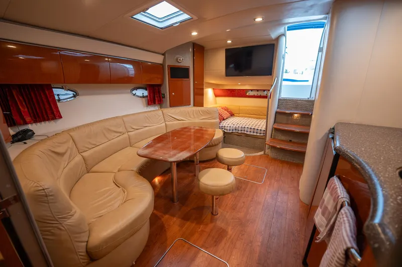  Yacht Photos Pics Luxurious interior of a 2008 Formula 40 Performance Cruiser with leather seating and wood accents.