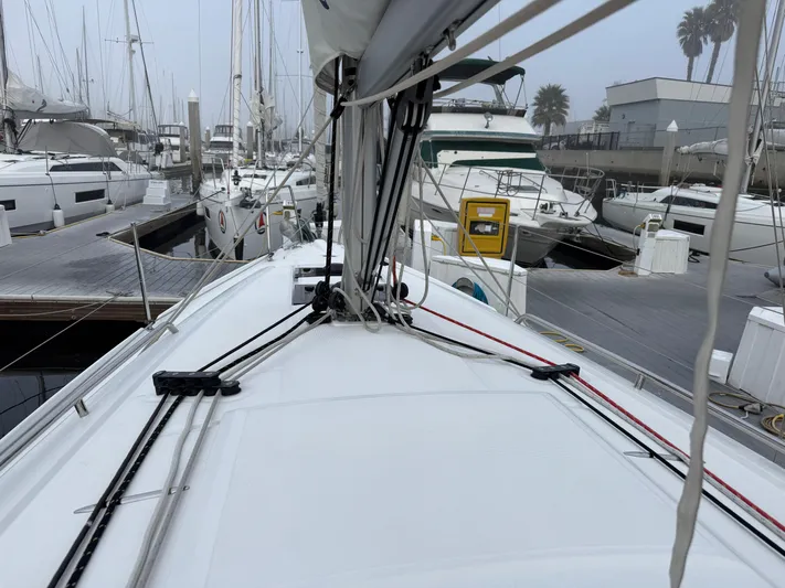 Stinger Yacht Photos Pics Beneteau Oceanis 30.1 sailboat docked in marina, 2022 model, overcast day.