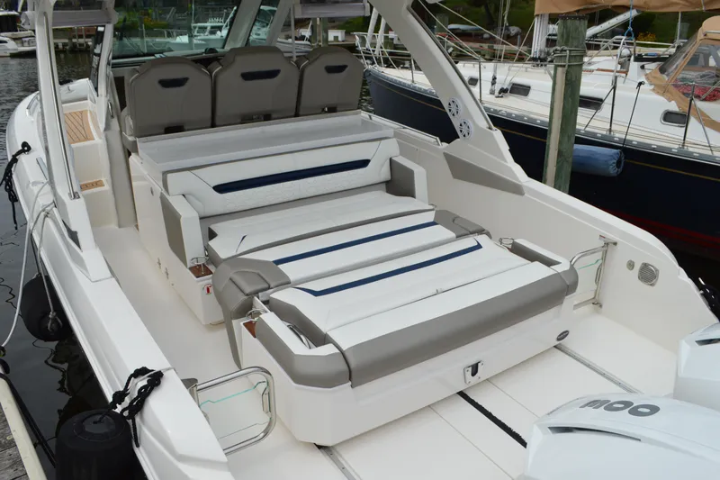 Encore Yacht Photos Pics 2023 Tiara Yachts 34 LS luxury boat interior with seating and modern design.