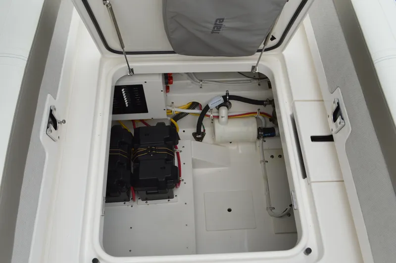Encore Yacht Photos Pics 2023 Tiara Yachts 34 LS engine compartment with batteries and wiring.