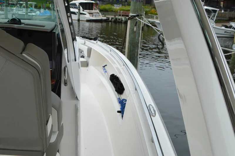 Encore Yacht Photos Pics 2023 Tiara Yachts 34 LS docked, showcasing sleek design and modern features.