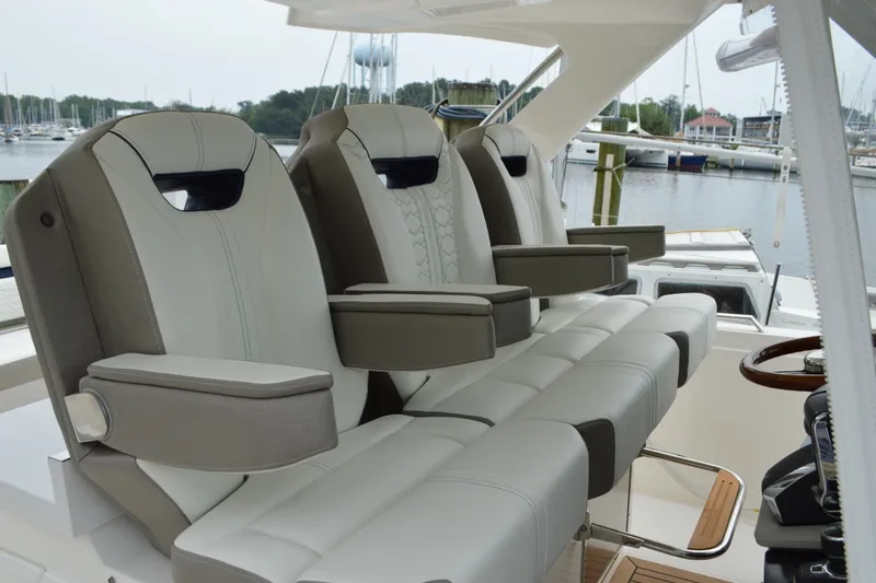 Encore Yacht Photos Pics Luxury seating on 2023 Tiara Yachts 34 LS, featuring elegant design and comfort.