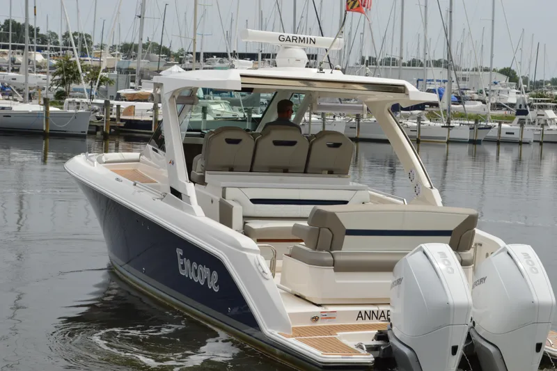 Encore Yacht Photos Pics 2023 Tiara Yachts 34 LS boat docked, featuring dual Mercury engines.