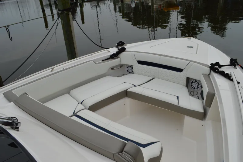 Encore Yacht Photos Pics Luxurious seating area on 2023 Tiara Yachts 34 LS, featuring elegant white upholstery.