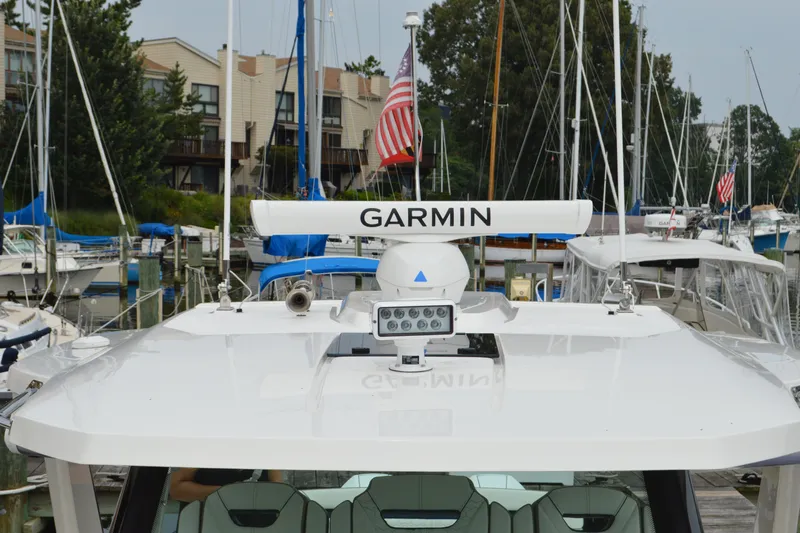 Encore Yacht Photos Pics 2023 Tiara Yachts 34 LS with Garmin equipment at marina.