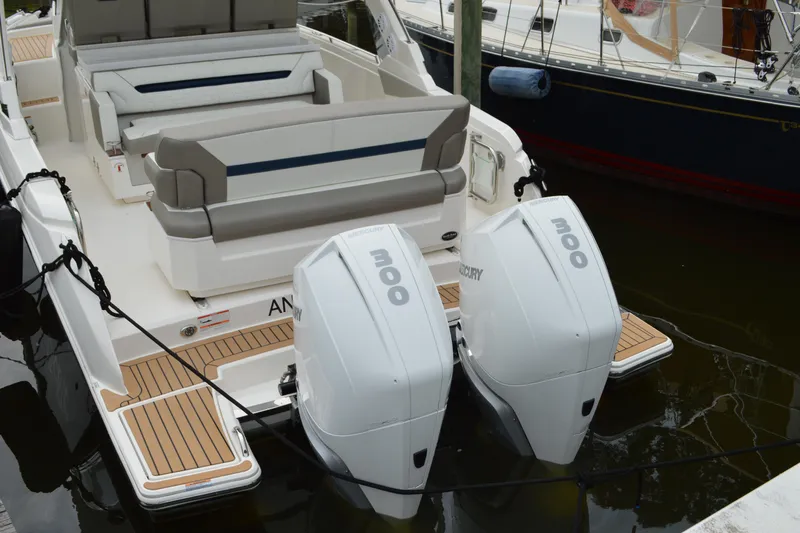 Encore Yacht Photos Pics 2023 Tiara Yachts 34 LS with dual Mercury 300 engines, docked at marina.