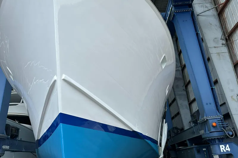 Miss Phebe II Yacht Photos Pics 1971 Whiticar Sportfish boat in dry dock, showcasing its sleek hull design.